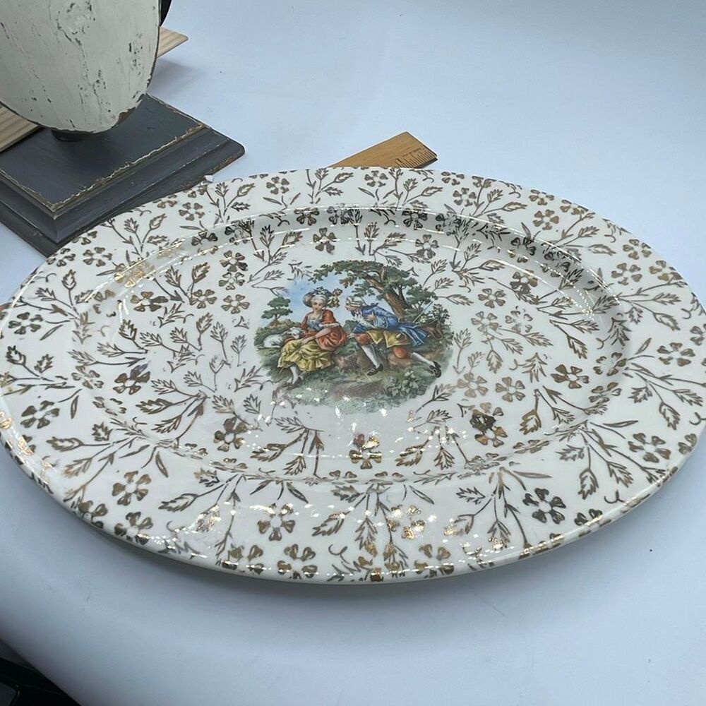 Vintage Atlas China Warranted 22K gold platter.